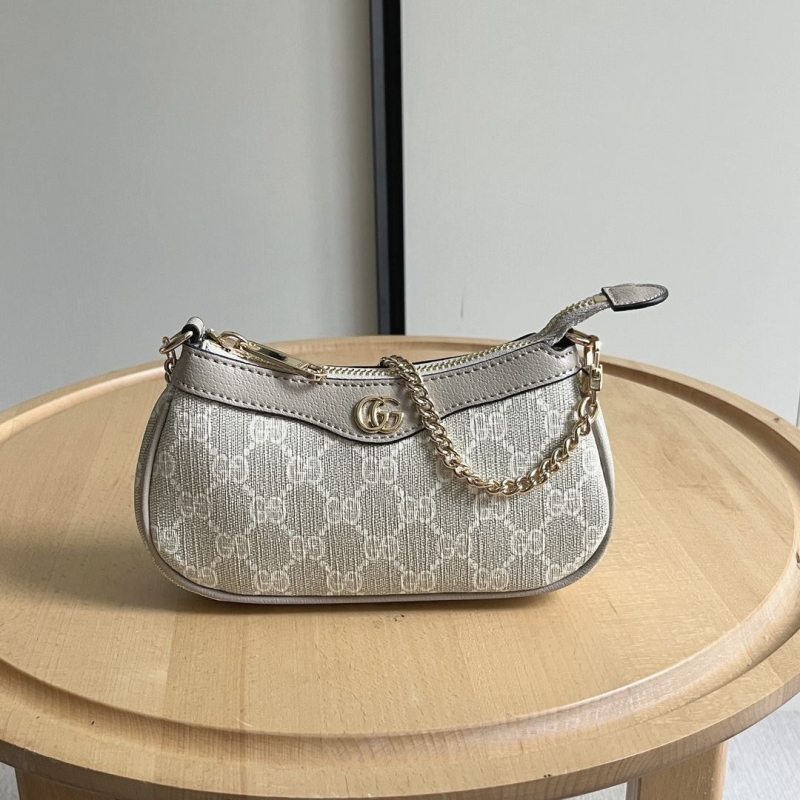 G*u*i top handle bags
